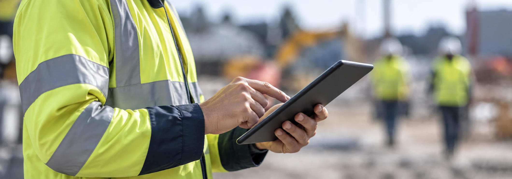 A field worker records a job on a tablet